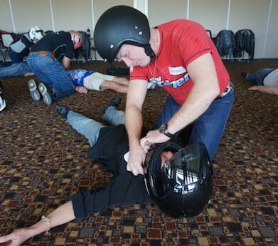 Particiants learn how to deal with helmets in a crash at the First Aid for Motorcyclists course carrot - York Motorcycle Festival Avon Valley Motorcycle Frendly Region Western Australia