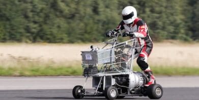 Matt McKeown (Plymouth) on his jet powered shopping trolley set an unofficial world record of 61.18mph (photo Steve McDonald) wheelie