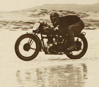 Levis Motorcycle Club member Reg Ellard races along Sellicks Beach in 1936.