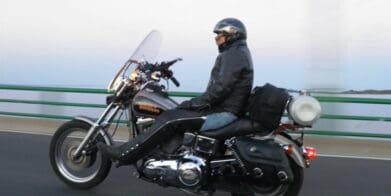 Michigan rider Phil Comar, known as the No Hands Man, has set a new world record for riding 600 miles without touching the handlebars.