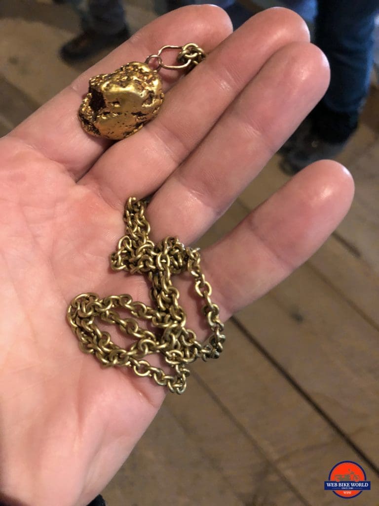 A half ounce gold nugget on a 1 ounce chain.