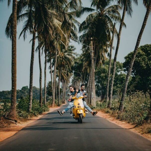 couple riding a scooter