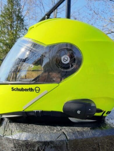 UClear AMPGo2 mounted on side of Schuberth C3 Pro helmet