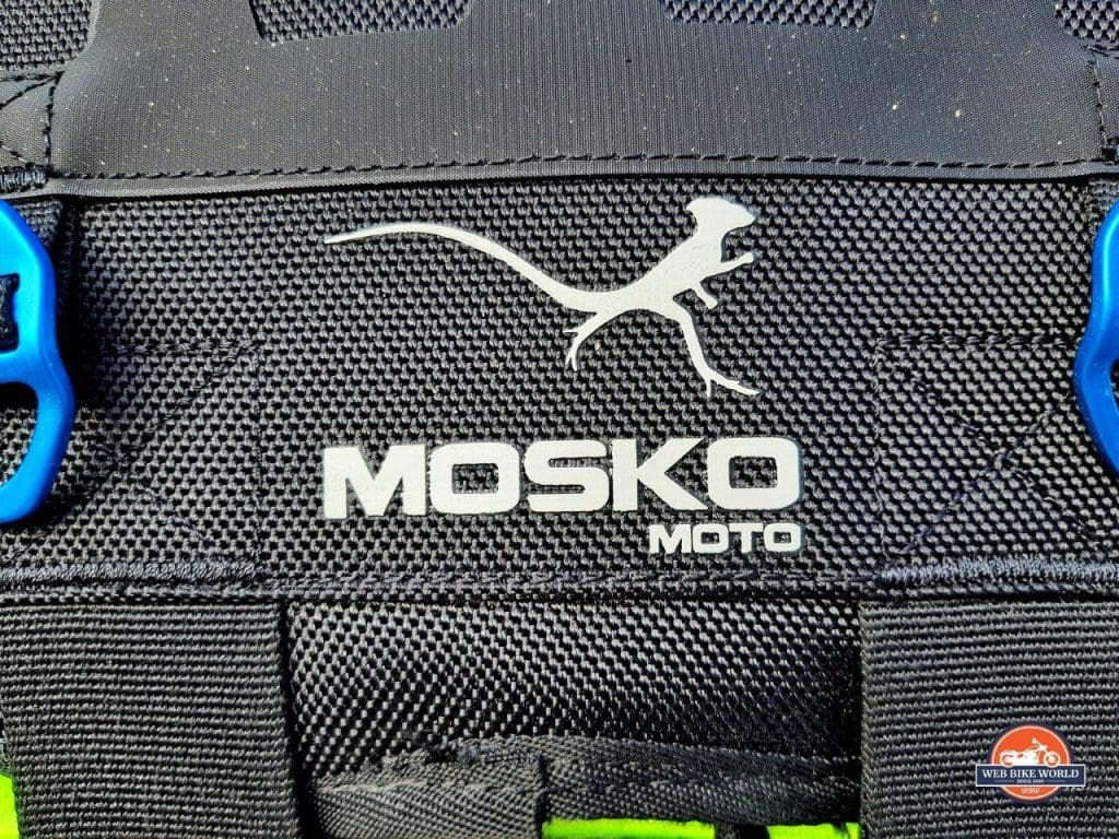 The Mosko Moto logo of a Basilisk lizard on some of their luggage.