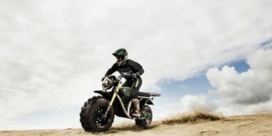 A rider trying out The Grunt, an electric off-roading motorcycle made by Volcon Powersports