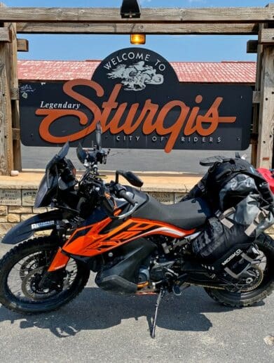 My KTM 790 Adventure in front of the welcome sign in Sturgis, SD.