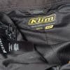 Interior tag of the Klim pants showing size and cut