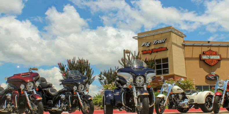 A view of Harley Davidson Motorcycle in front of Pigs Trails Harley Davidson Dealership