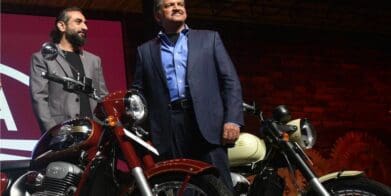 A view of Anand Mahindra - CEO of Mahindra Group - and stakeholder for 60% of BSA Motorcycles, next to a series of JAWA Motorbikes