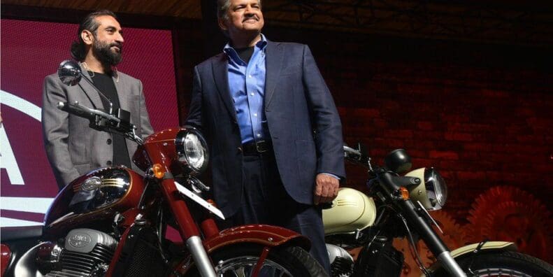 A view of Anand Mahindra - CEO of Mahindra Group - and stakeholder for 60% of BSA Motorcycles, next to a series of JAWA Motorbikes