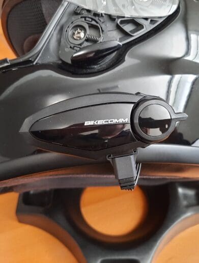 Close up of Bikecomm BK-S2 system on black helmet