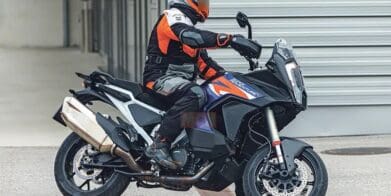 A view of the KTM Super Adventure being taken for a scoot about the block with road-going tires, Ducati Pike Peak style.