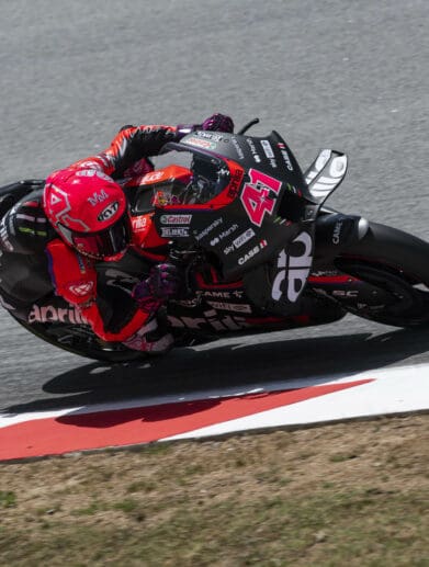 Aprilia Racing leaning into the twisties this past weekend, during which Espargaro and Vinales Claim 1st and 2nd place. Photo courtesy of Aprilia Racing's press release.