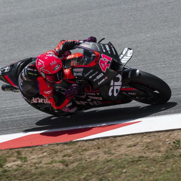 Aprilia Racing leaning into the twisties this past weekend, during which Espargaro and Vinales Claim 1st and 2nd place. Photo courtesy of Aprilia Racing's press release.