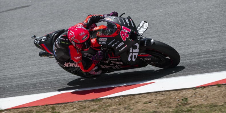 Aprilia Racing leaning into the twisties this past weekend, during which Espargaro and Vinales Claim 1st and 2nd place. Photo courtesy of Aprilia Racing's press release.