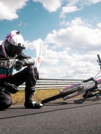 Elias Schwärzler and Geri Gesslbauer cracking the Guiness World Record for 'fastest ever standard bicycle towed by a motorbike.' Media sourced from Elias's Facebook.