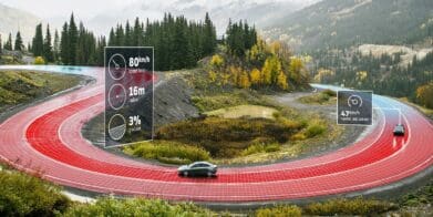 a car going around a bend, moderated by Intelligent speeding assistance. Media sourced from TomTom.