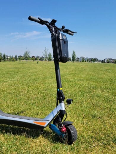 Varla Pegasus Scooter parked in field