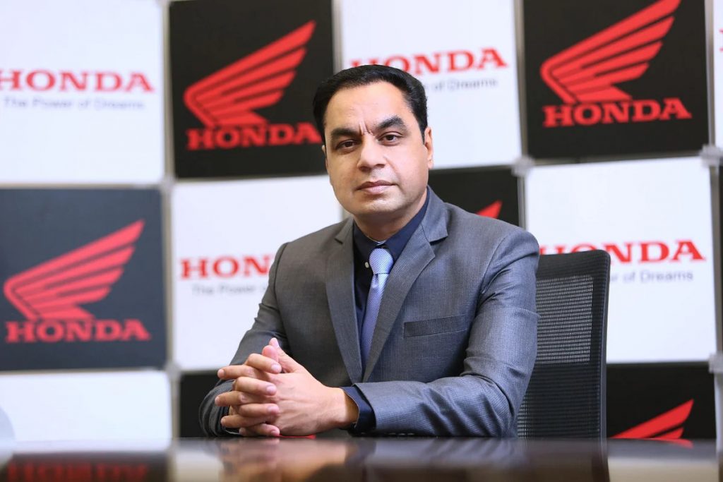 A headshot of Sales and Marketing Director of Honda Motorcycle & Scooter India Pvt. Ltd., Yadvinder Singh Guleria