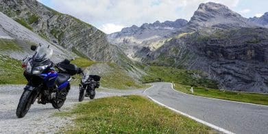 A motorcyclist enjoying the view of the Italian Dolomites. Media sourced from LIFE ON MOTO.