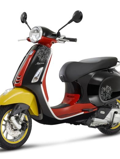 Vespa's 2023 Disney Mickey Mouse Edition scooter, built upon the brand's Primavera model. Media sourced from Piaggio's recent press release.