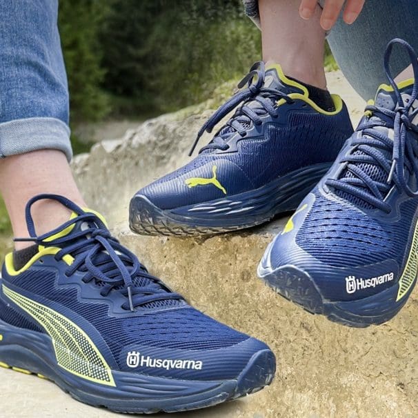 A view of the PUMA Nitro 2 running shoes, currently carrying a Husqvarna scheme. Available at select participating dealerships. Media sourced from Husqvarna.