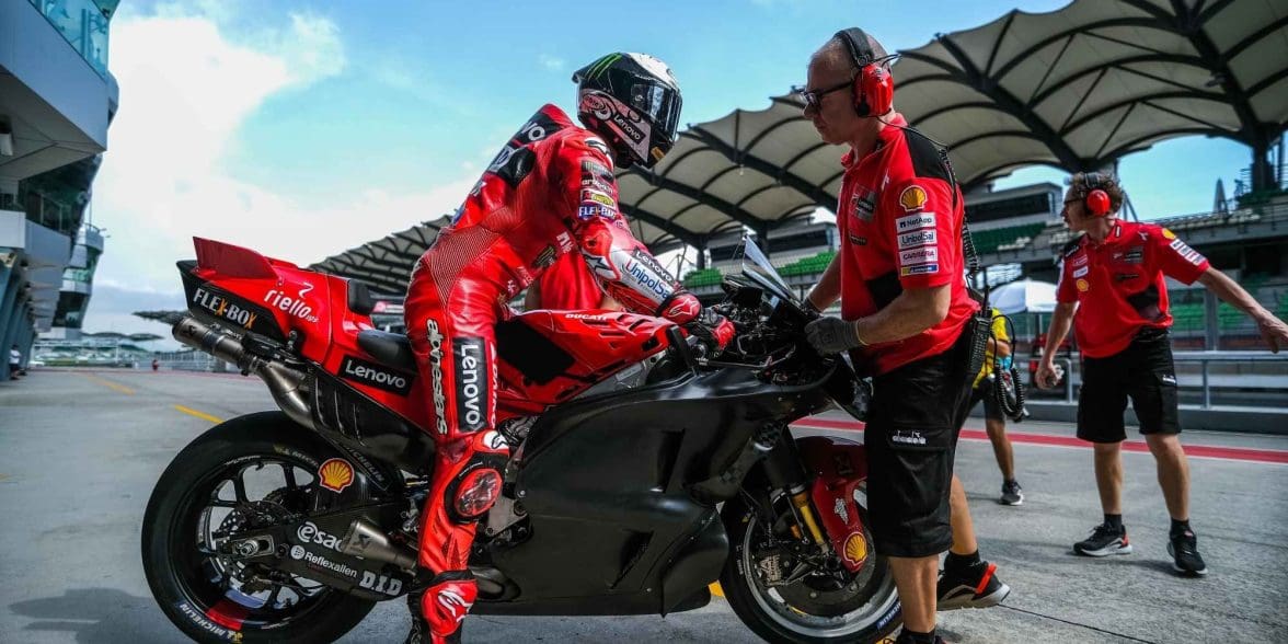 A Ducati MotoGP bike with a rider.