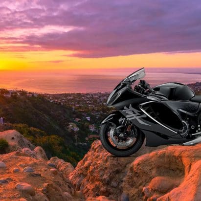 A supersport motorcycle in front of a sunset.