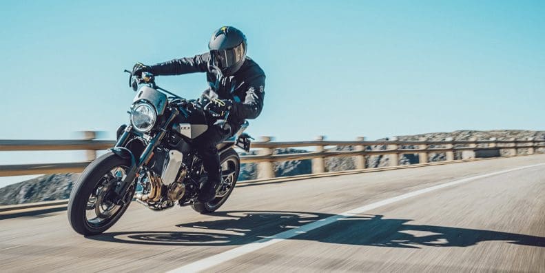 A motorcycle rider on the road.