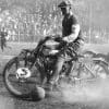 A motorcyclist playing ball.