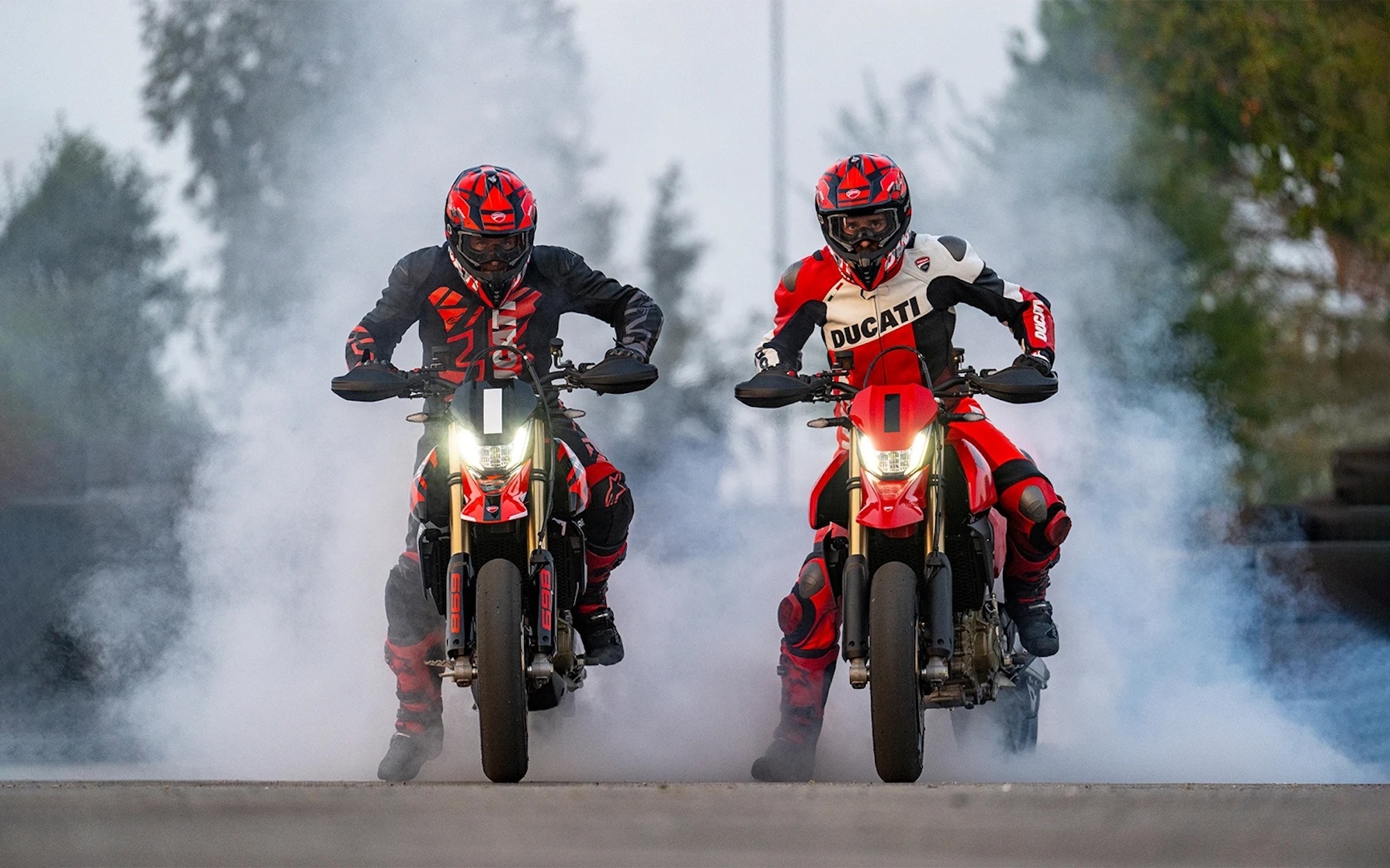 A picture of two fo Ducati's Hypermotard 698 Mono bikes.