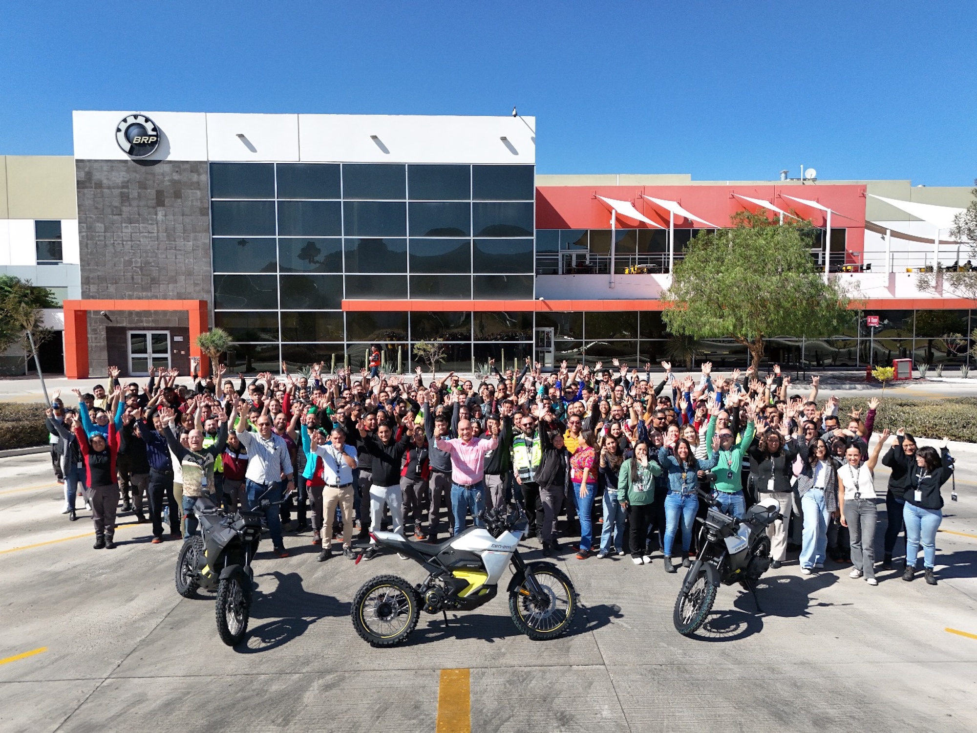 A view of the Can-Am team and the first Origin to roll off the production line at Can-Am.